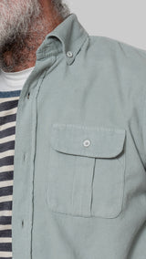 Microcorduroy shirt with green pockets